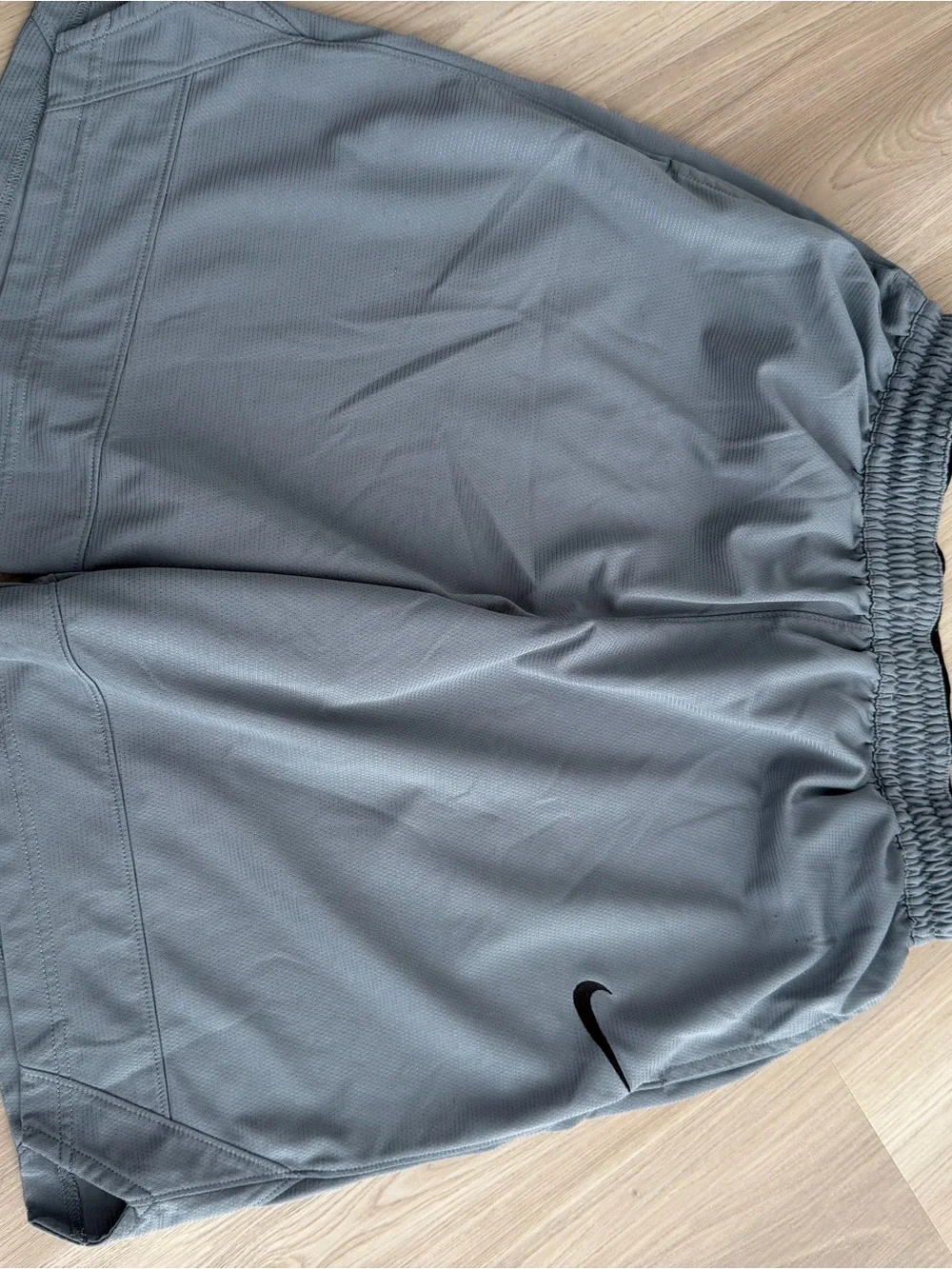Nike Light Gray Performance Shorts with Black Swoosh